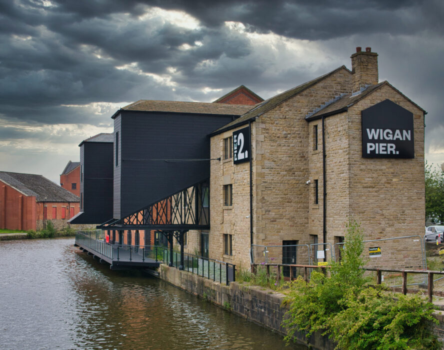 Warehouse buildings at Wigan Pier on the Leeds – Liverpool Canal. Now under redevelopment for housing and public access areas including a food hall and event centre.